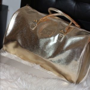 Michael Kors gold travel bag!